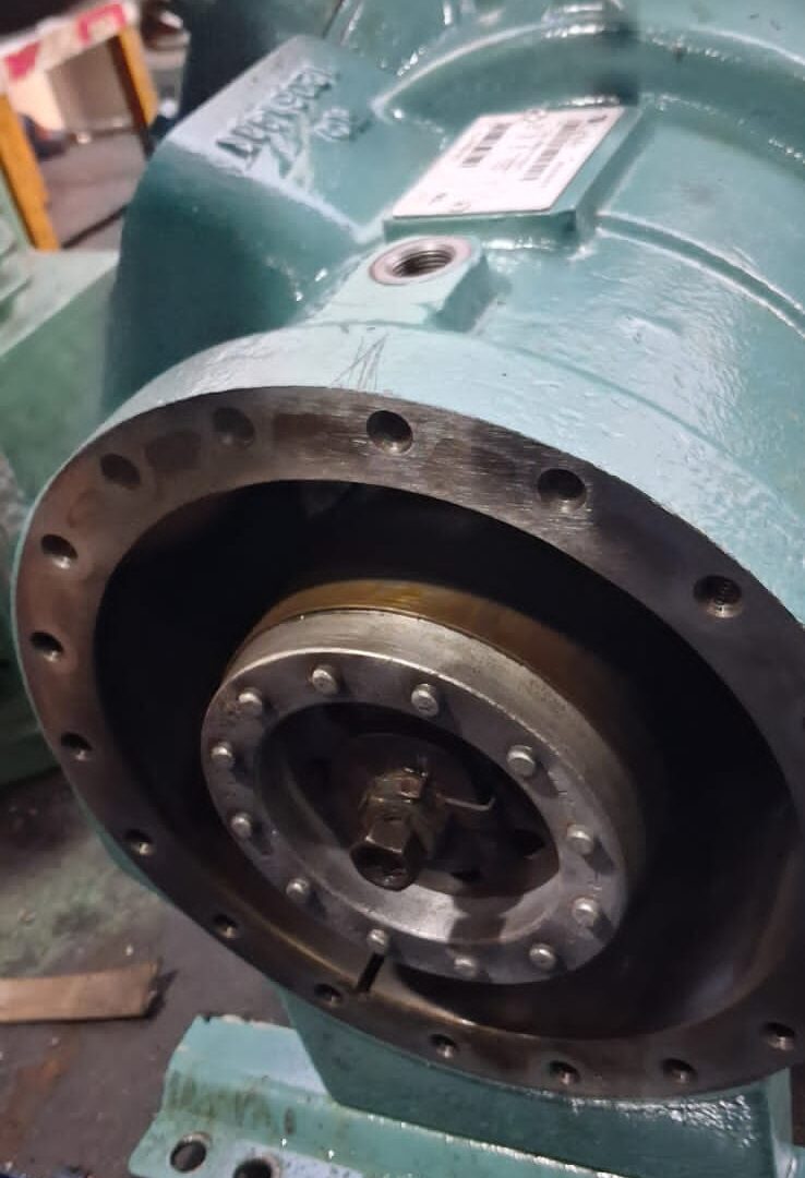 Compressor end cover removed exposing the crankshaft and bearing housing flange