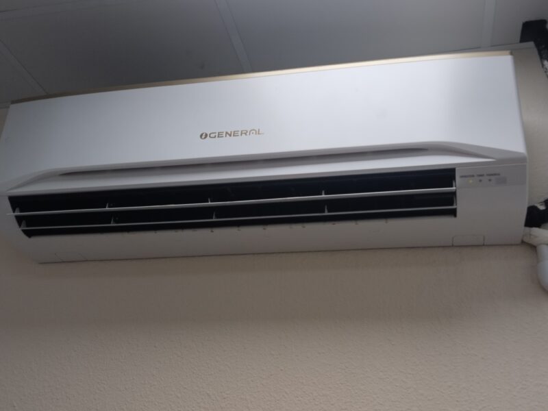 High wall split air conditioning indoor unit installed to a clean commercial finish in Dubai